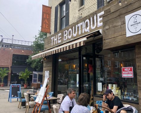 the boutique, a restaurant in Astoria, with outdoor seating