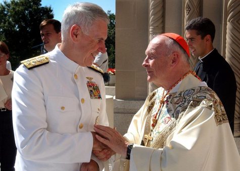 at left, Admiral William Fallon greets then-Cardinal McCarrick in a 2001 photo following the 9/11 terrorist attacks