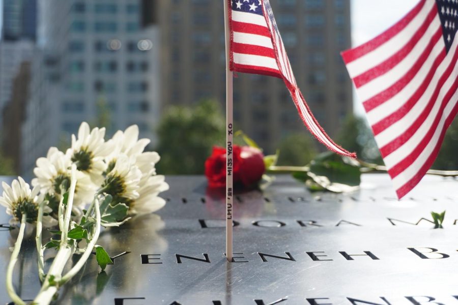 an image of a flag in a name at the 9/11 memorial