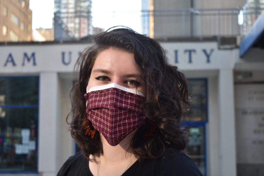 student wearing mask for mandate outside fordham lincoln center