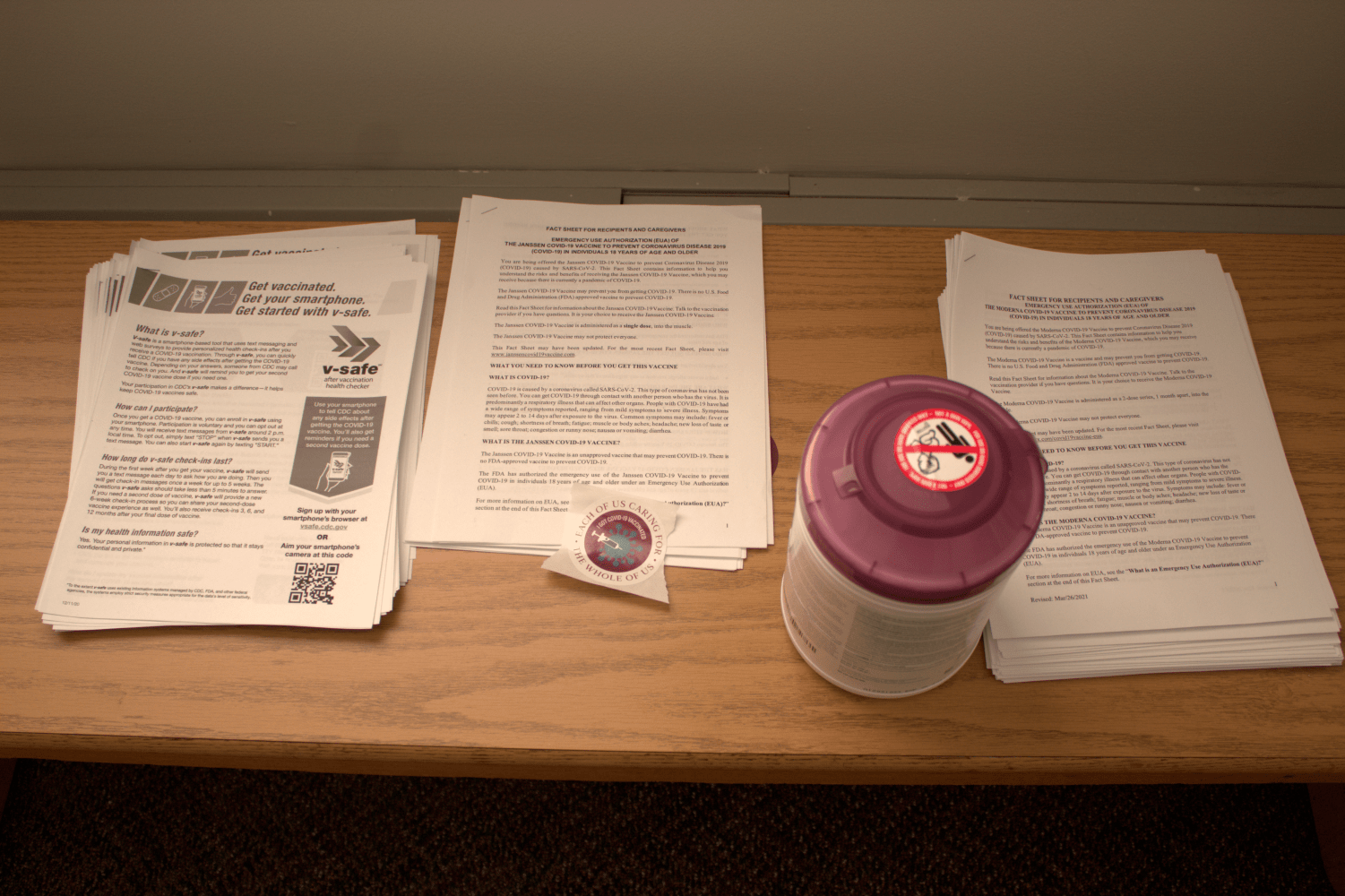 paperwork and wipes on a table at the testing center