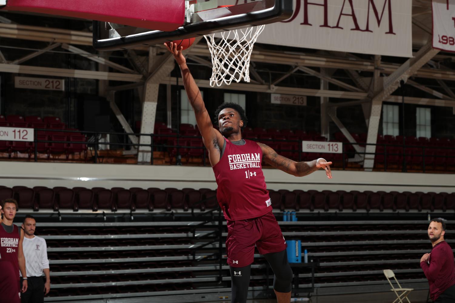 chuba ohams lands a basket in basketball practice