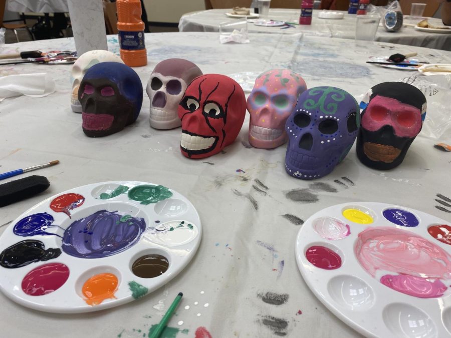 Students learn about the long joyous history of Día de los Muertos while painting sugar skulls.