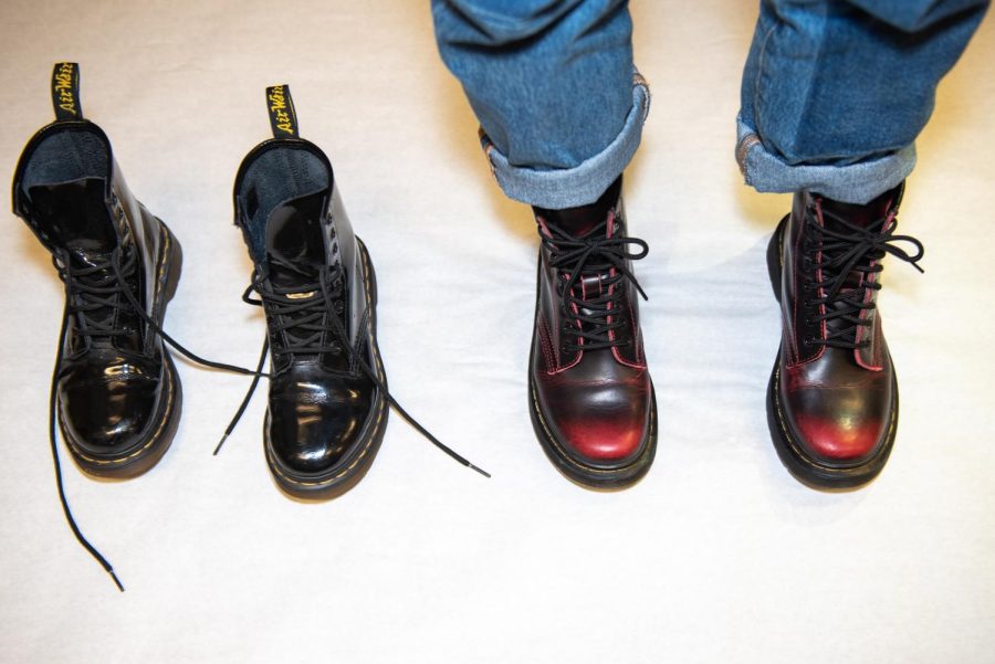 doc+martens+with+one+empty+pair+and+one+with+feet+in+them