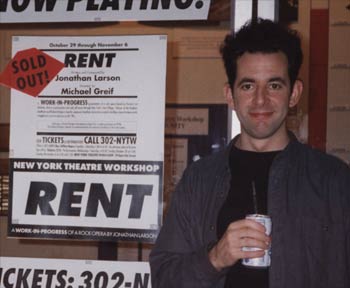 jonathan larson in front of sign for rent for tick tick boom article