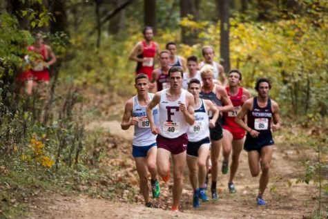 fordham cross country team running in a race