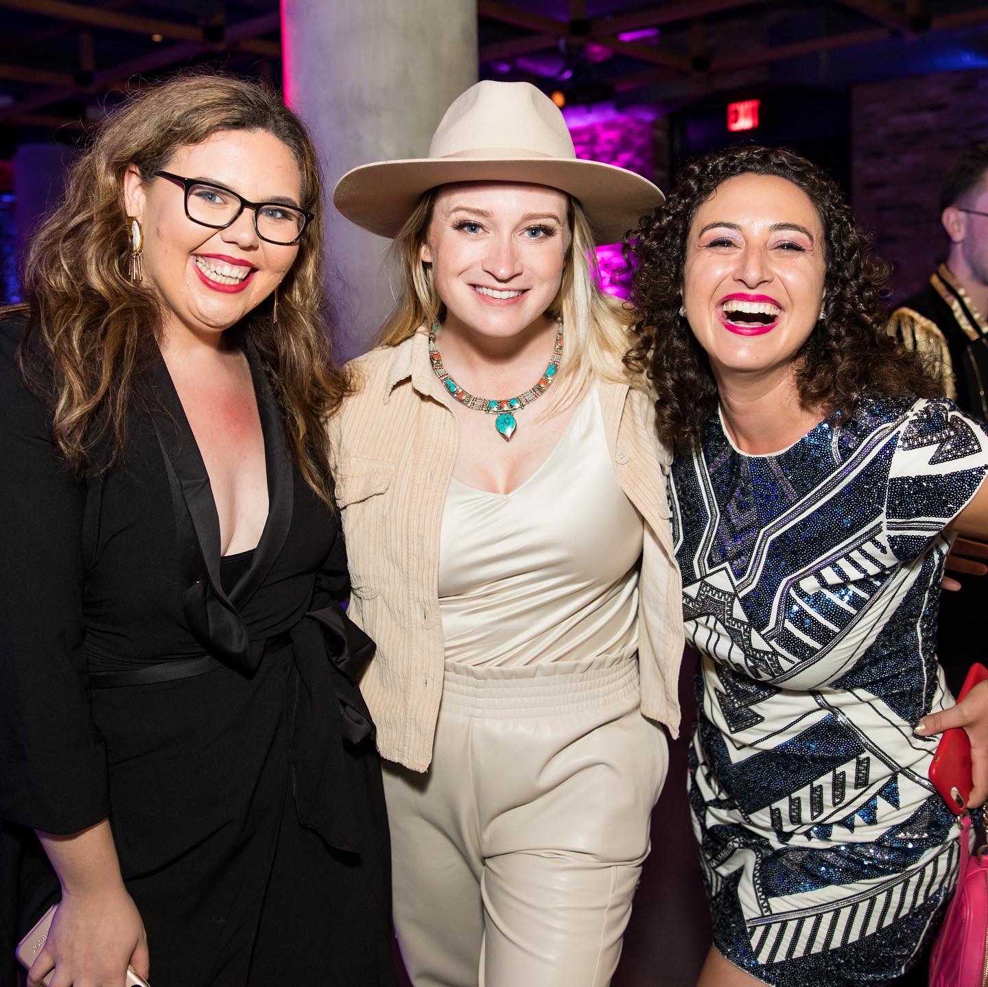 morgan smiles with two cast members of freestyle love supreme on opening night in nice clothes