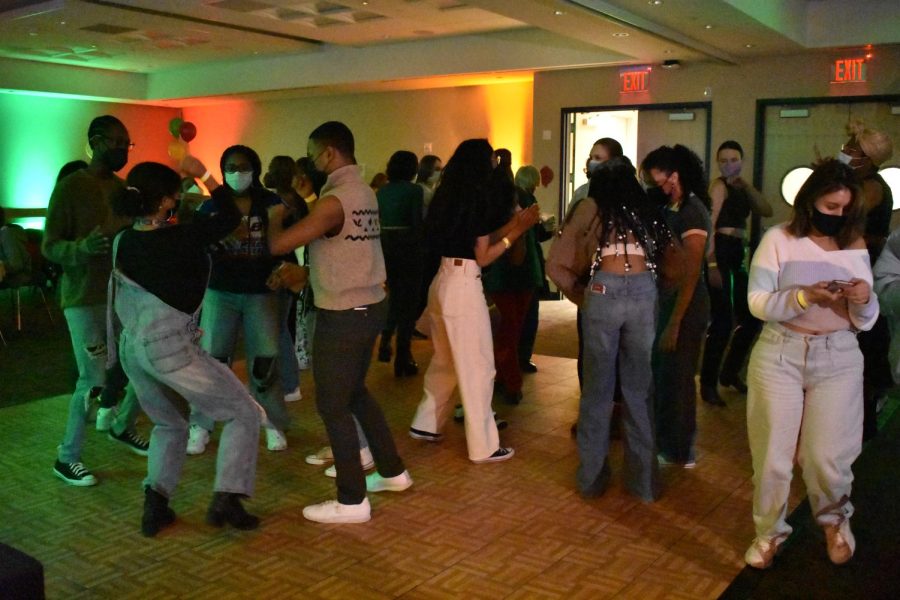 students dancing at bipoc mixer in g76 in the 140 w building