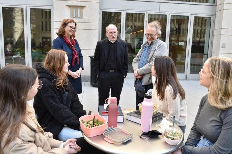 tania tetlow and rev mcshane standing at lincoln center talking to students
