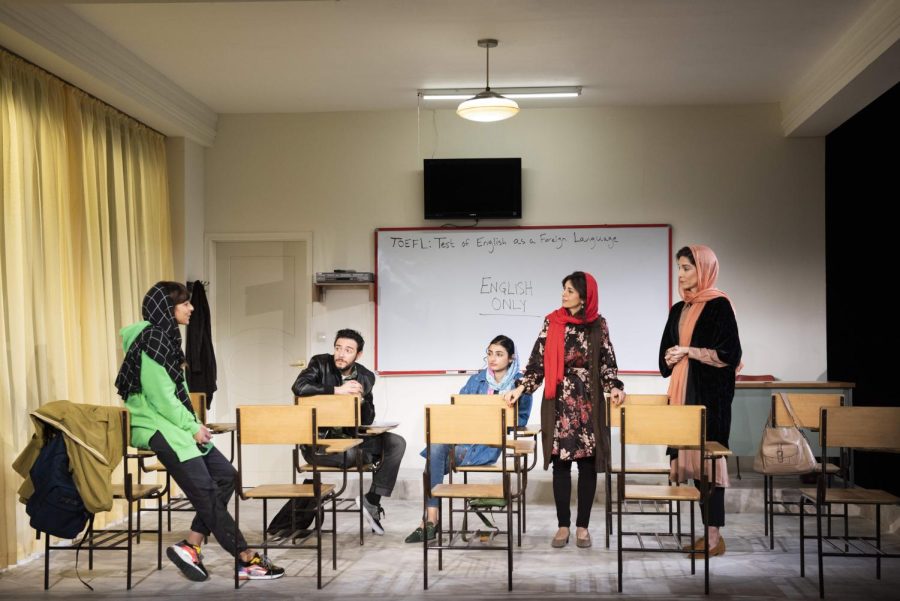 English+Atlantic+Theater+Company+with+four+actors+on+stage+in+a+classroom+setting.+the+women+are+wearing+head+scarves+being+in+Iran