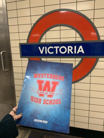 playbill for heathers in front of victoria station tube stop sign