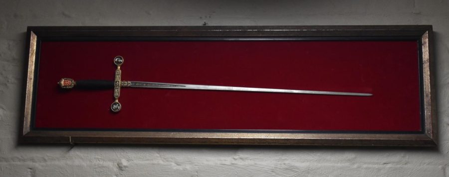 long thin sword in a case lined with red velvet