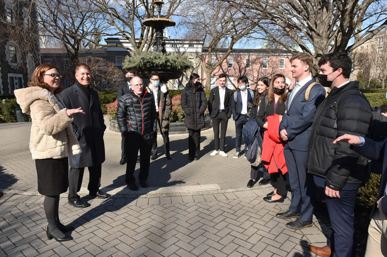 Tania Tetlow and Rev. McShane speak with students