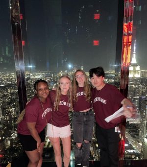OLs pose for a photo at the top of One Summit Vanderbilt, one available excursion option.