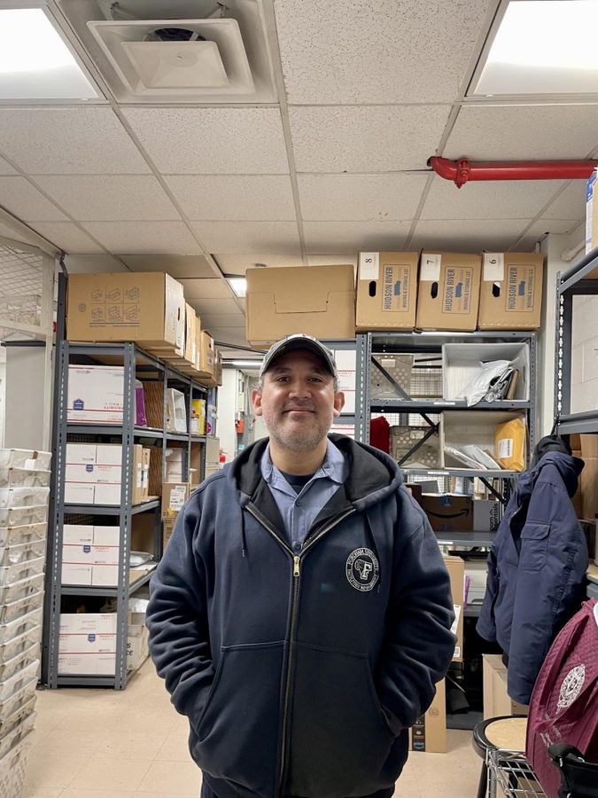 The noise from students and atmosphere on campus are what John Borelli Jr. loves most about working in the mailroom.