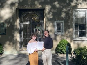 Kate West, Graduate School of Arts and Sciences ’23, and Caroline Doyle, Fordham College at Rose Hill ’23, delivered the open letter at Cunniffe Hall on Sept. 29.