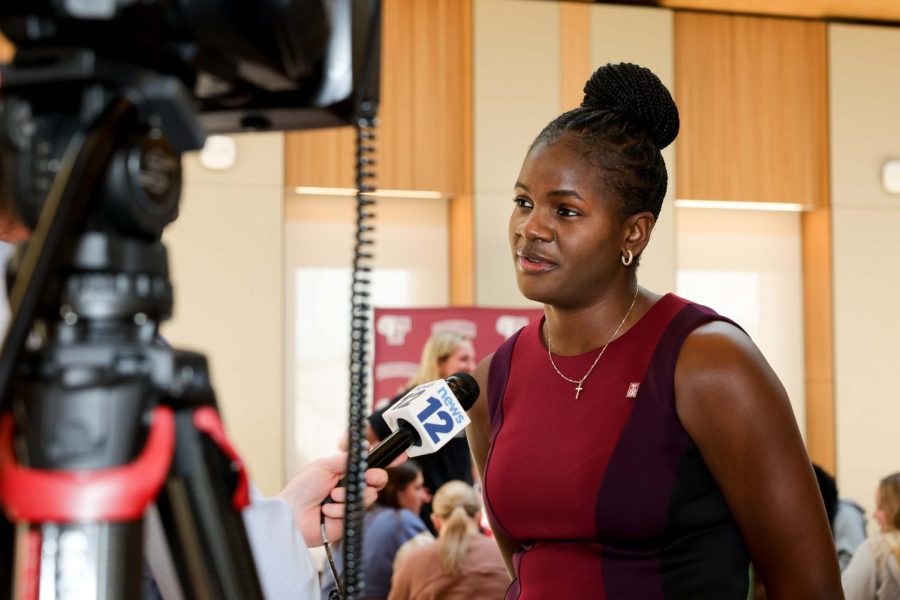 Bridgette Mitchell is interviewed by News 12 during a press conference hosted by Fordham Athletics.