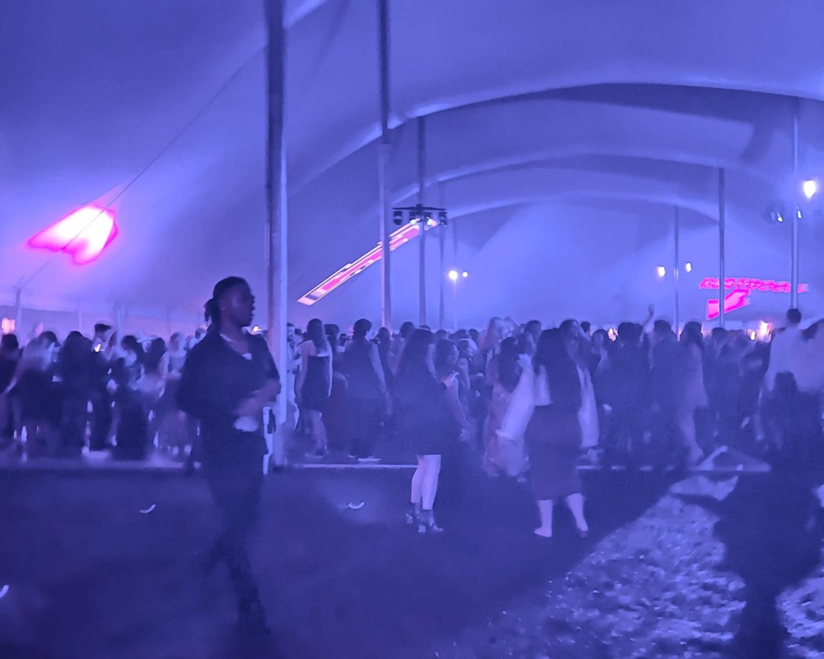 Even with the rain pouring outside the tents at this year’s President’s Ball, Fordham students from both campuses came together for music, food and dancing.