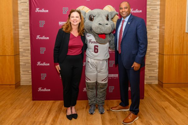 Tetlow welcomed Guthrie to Fordham and introduced him to student-athletes and the community at a press conference on Nov. 21, both pictured alongside Fordham mascot Ramses.