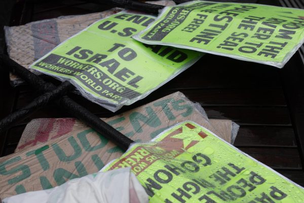 Protestors leave stray signs around the protest route. 
