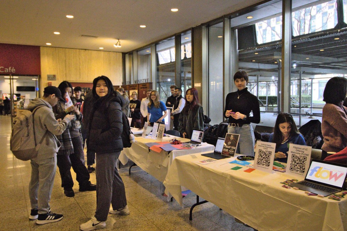 Fordham students attend the spring club fair. 