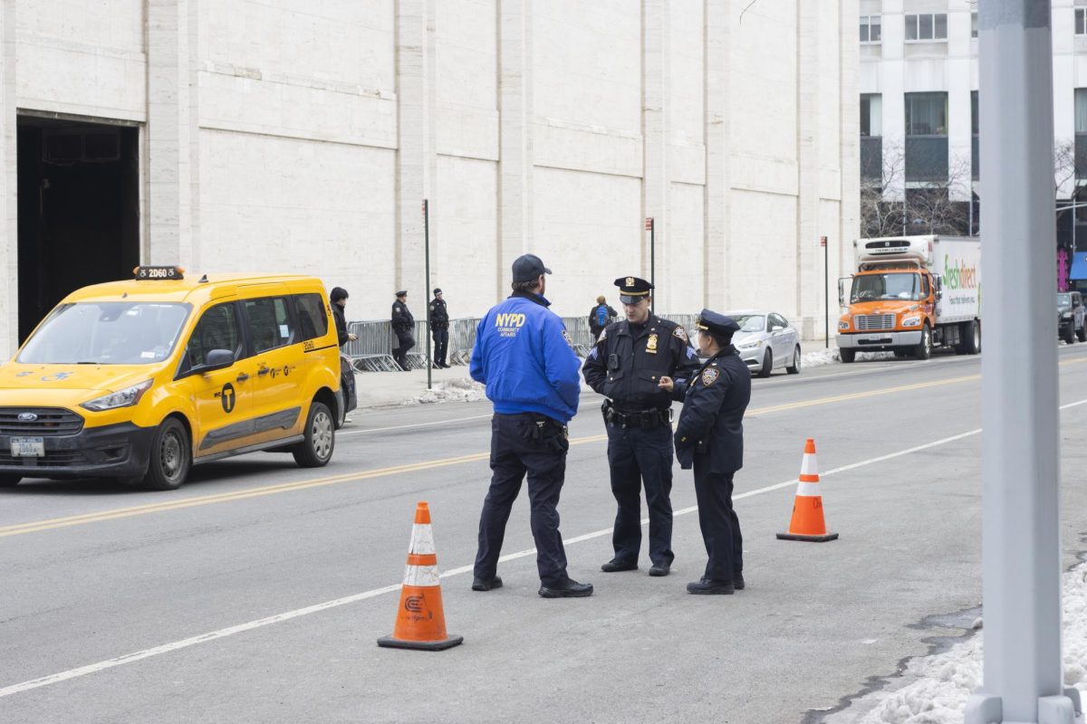 Police and public safety officials were present in and around the law school in the event of protest.