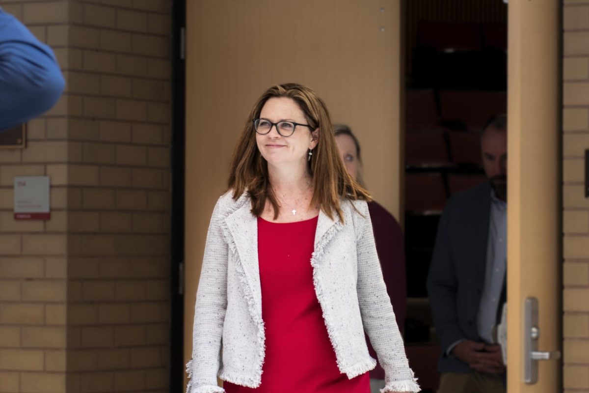 University president Tania Tetlow leaves after delivering the address. 