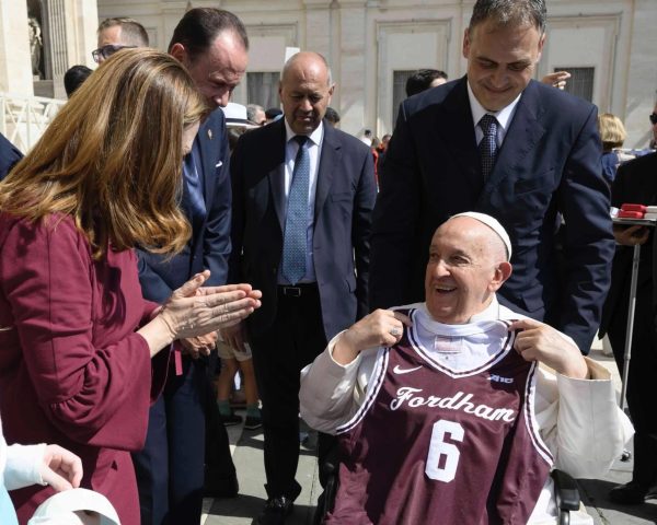 University President Tania Tetlow met with Pope Francis in June 2024 and gave him a Fordham basketball jersey. 