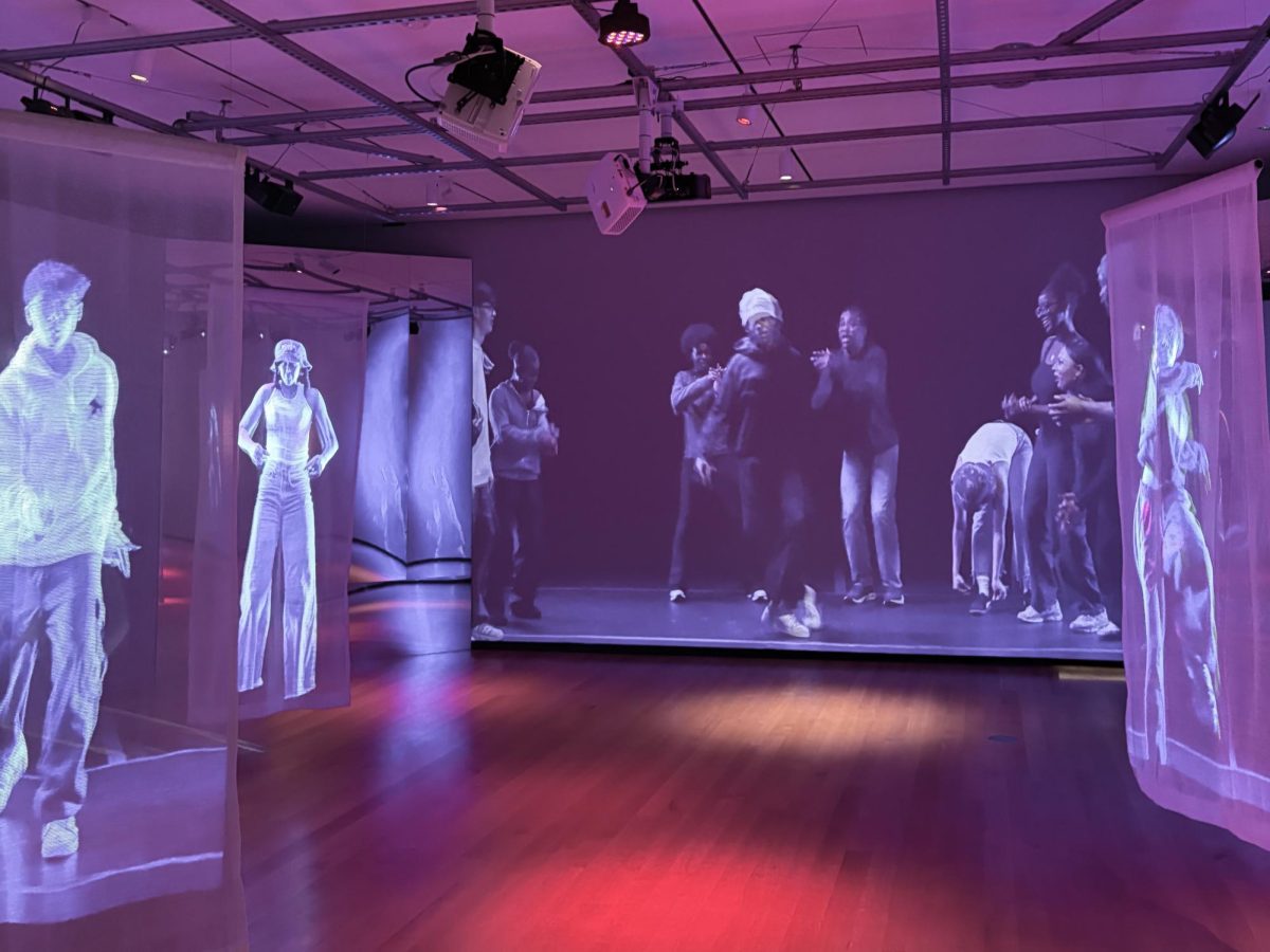 With limited wall space, “Urban Stomp” curator Derrick Washington got creative with color and audiovisual experiences.