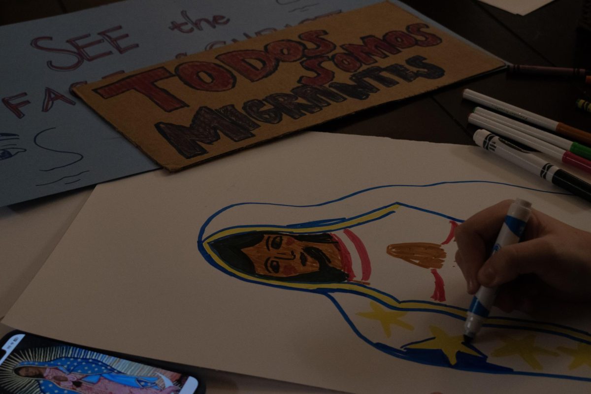 There were two sign-making events on the Rose Hill campus before the procession, where attendees were provided a list of ideas for what to write.