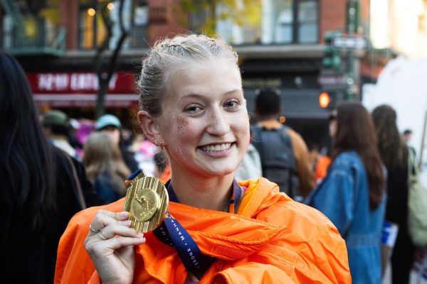 Avery Ash, FCLC ’28, finished the marathon with friends cheering her on along the way. 