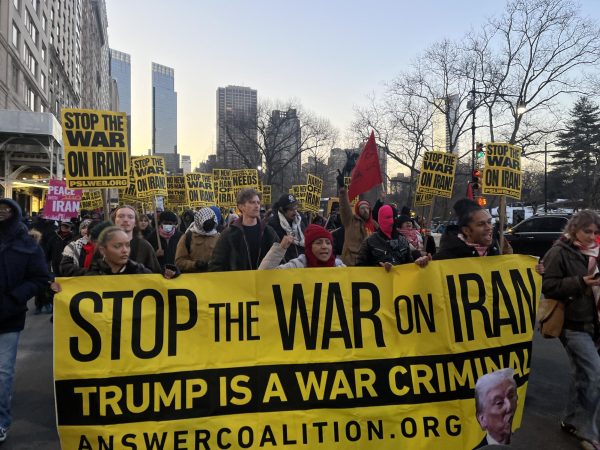 Organizers passed out signs with messages like “Stop the war on Iran!” and “No new U.S. war in the Middle East” to attendees, as well as flyers and hand warmers.