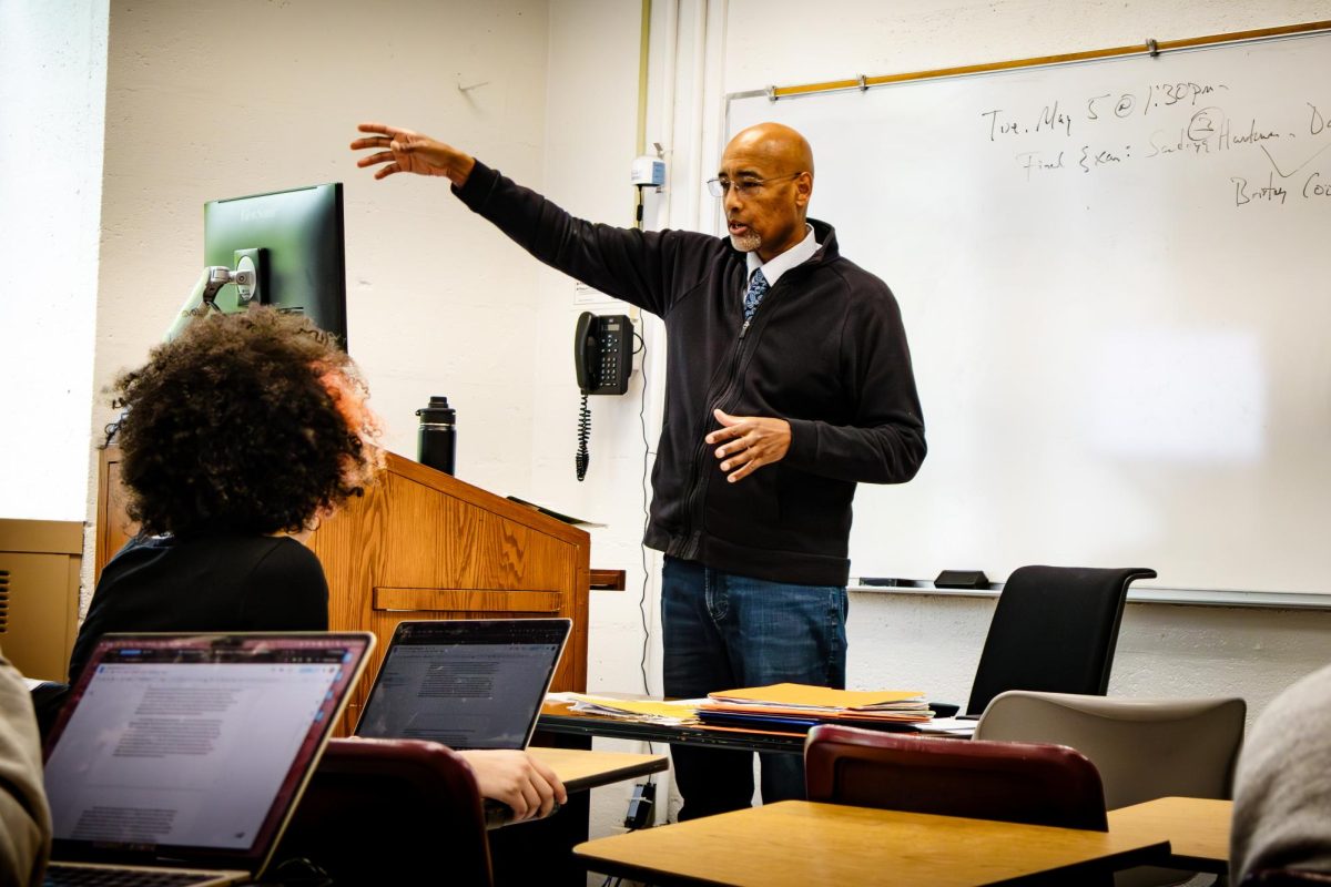 Mark L. Chapman, associate professor of African and African American Studies at Fordham, is pictured in class. 